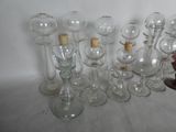 a lot of empty wine glasses and bottles on the table