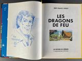 an open book with a drawing of a man on it