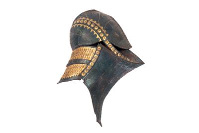 an image of a wooden helmet with gold trims on a white background
