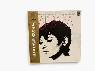 a book with a picture of a woman ' s face on it
