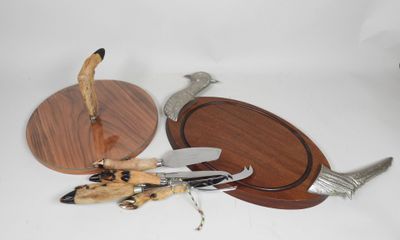 a knife, knife holder, and other items on a table