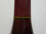a bottle of wine that is sitting on a table