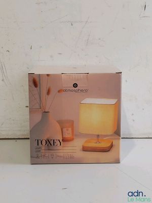 a box with a lamp on it sitting on a table