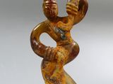 statue of a woman holding a child in her arms