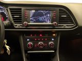 the dashboard of a car with a digital display in the center