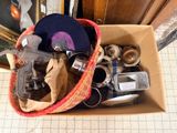 a box full of assorted items sitting on the floor
