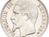an image of a silver coin with a man ' s face on it