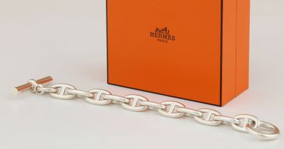 a close up of a box with a chain on it