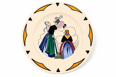 a plate with a picture of a woman and a man on it