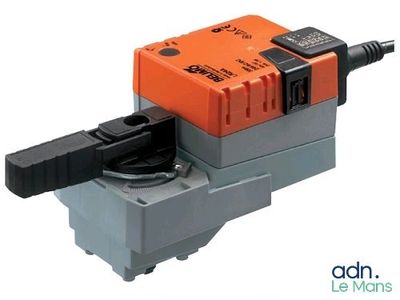 a close up of an orange and black switch on a white background