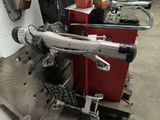 a machine that is sitting on the ground in the garage