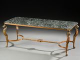 une image représentant une table avec un plateau en marbre et des pieds dorés