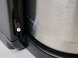 a close up of a coffee maker on a counter
