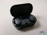 a close up of a pair of earphones in a case
