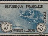 a close up of a stamp with an image of a woman on a horse