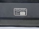 a close up of a sign on the back of a car