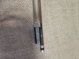 a pen that is laying on a piece of cloth