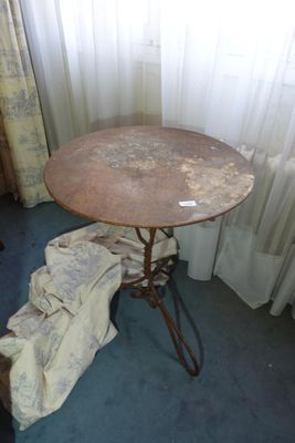 a small table with a cloth on it in a room