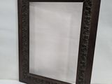 an image of a picture frame sitting on top of a white surface