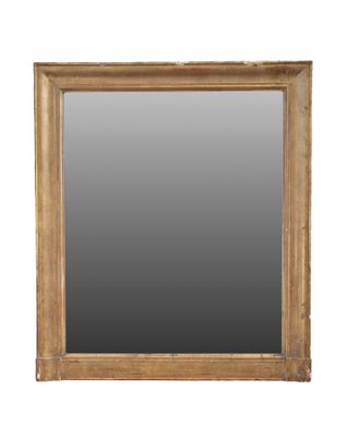 a wooden framed mirror with a white background