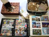 a suitcase full of stamps and money on a table