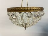 a chandelier hanging from the ceiling in a room