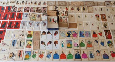 a lot of cards on the table with pictures on them