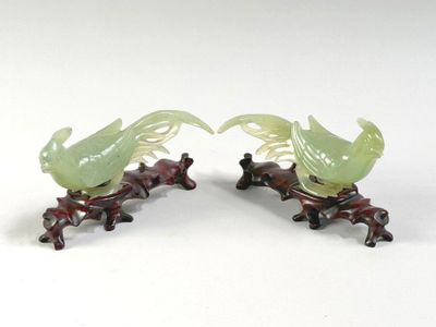pair of chinese carved jade bird figurines on stand