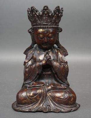 CHINE. Bouddha assis. Bronze à patine brune dans le gout des…