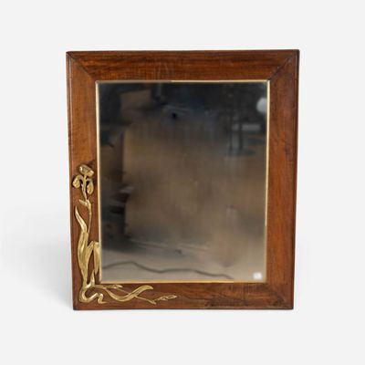 an image of a wooden frame with a mirror on it