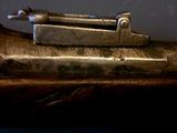 a gun that is sitting on top of a table