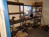 a room that has a bunch of shelves in it