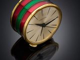 a clock that is sitting on top of a table