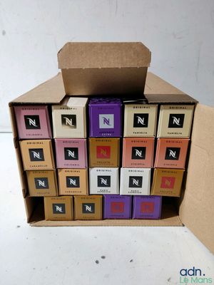 a cardboard box with a bunch of boxes of chocolates in it