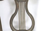 a small table with a harp on top of it