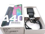 a box that has a phone in it and a charger attached to it