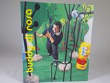 une carte sur laquelle figure l'image d'un homme réalisant une figure en skateboard