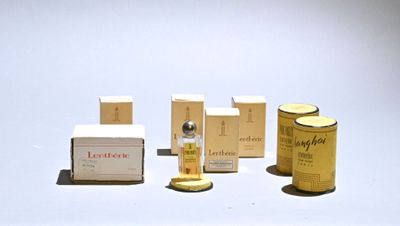 a lot of different types of perfumes on the table