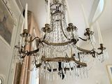 a chandelier that is hanging from the ceiling