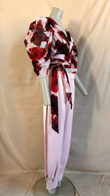 an image of a mannequin dressed in a red and white floral dress
