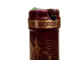 a bottle of wine that is sitting on a table