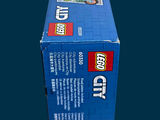 a box of legos sitting on top of a table