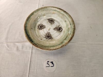 a small bowl that is sitting on a table