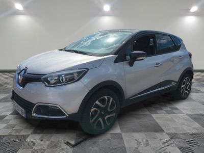 a white renault c - cross parked on a checkered floor