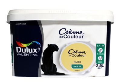 a close up of a tub of cream with a dog on it
