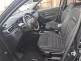 the interior of a car with a steering wheel and a dash board