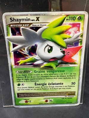 a close up of a pokemon card on a table