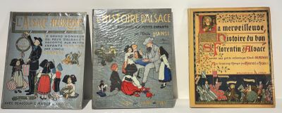 three books that are sitting on a table