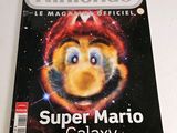 the front cover of a magazine with a picture of a monkey on it