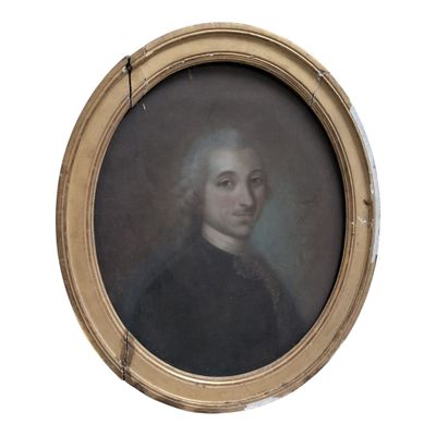 portrait d'un homme en manteau noir, dans un cadre ovale doré